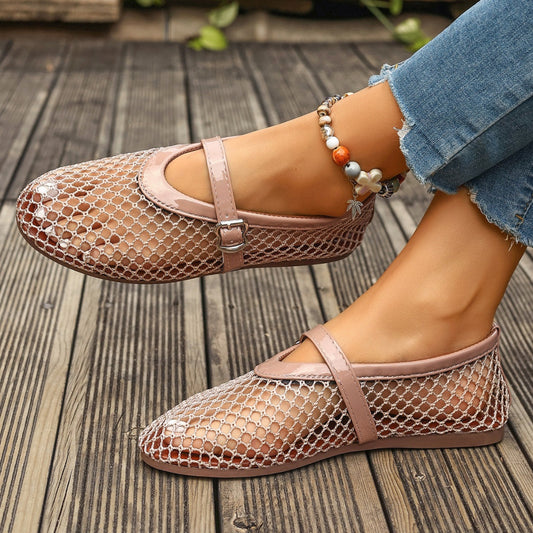 Pink round-toe mesh flats with pink strap and buckle