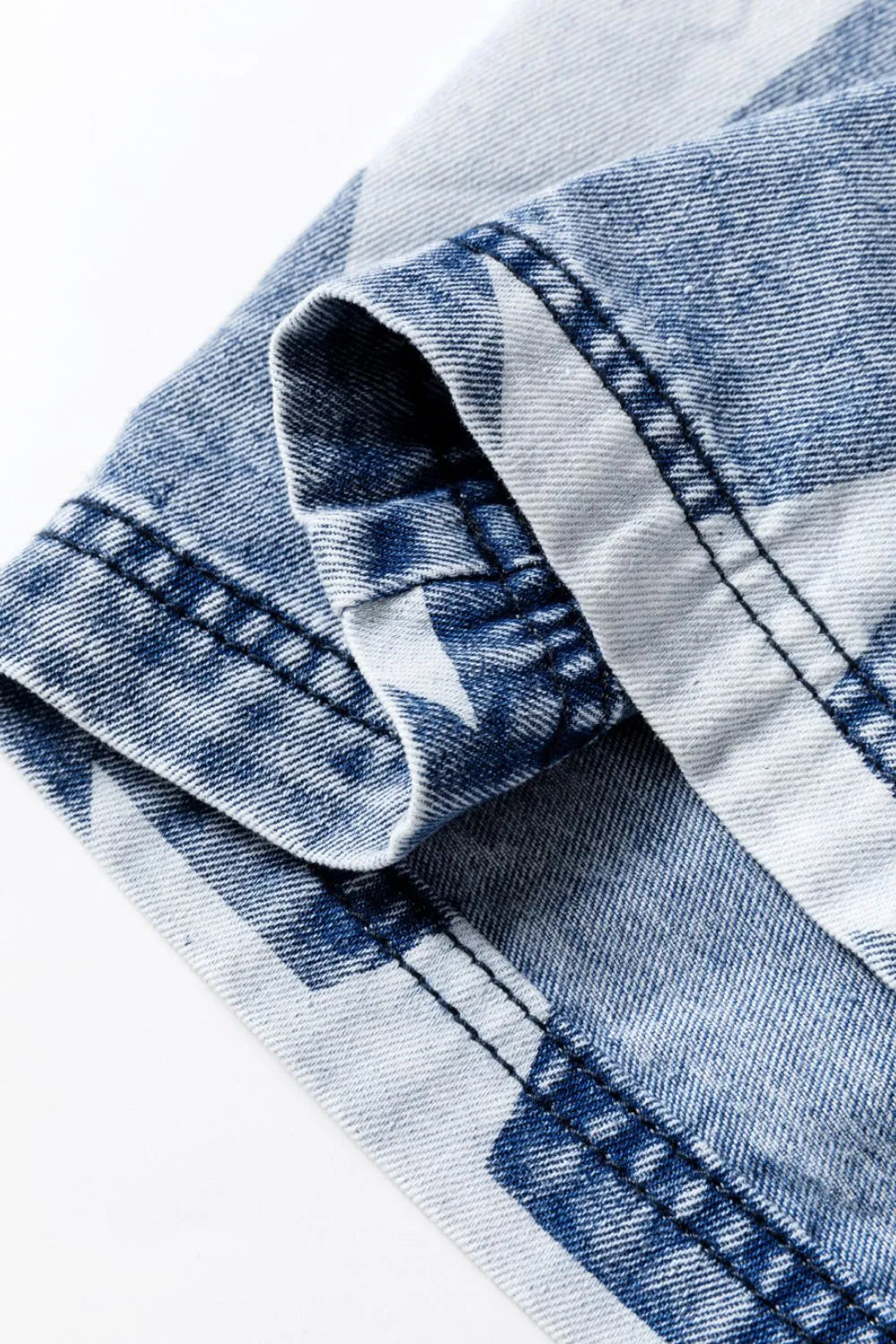 Washed denim cuff detail with star print and contrast stitching