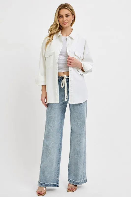 Medium wash straight-leg jeans with drawstring waist and front pockets