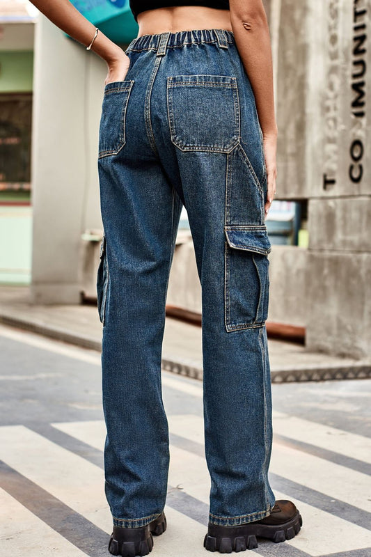 Loose-fit medium blue denim cargo pants, back view with side and back patch pockets