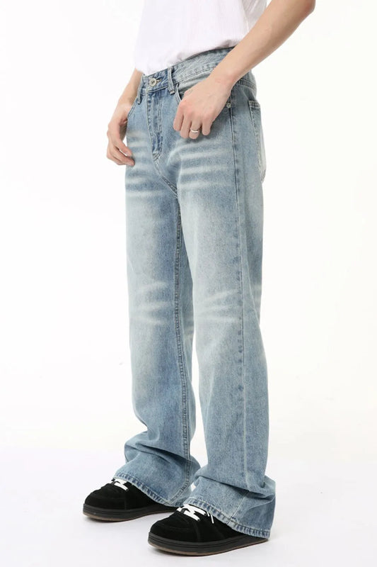 Light blue baggy jeans, side view with roomy pockets and wide straight legs