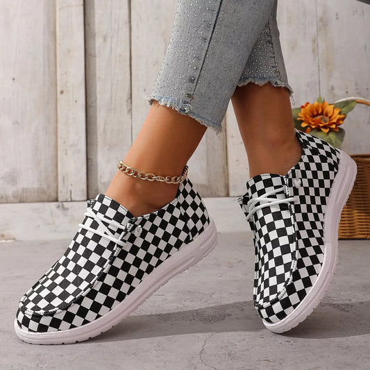 Black/white checkered casual sneakers with lace-up front, white rubber sole