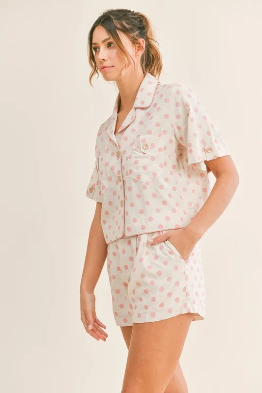 Pink polka dot collared crop top and matching lounge shorts set, side view