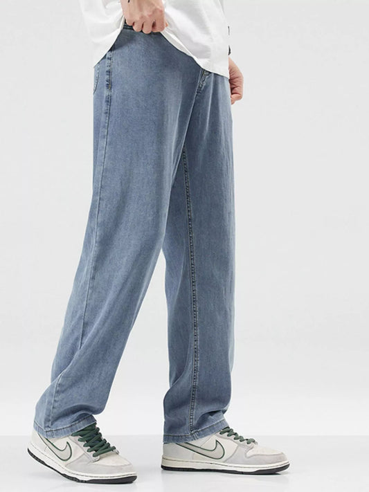 Men's wide-leg jeans, medium blue denim wash, relaxed straight leg opening