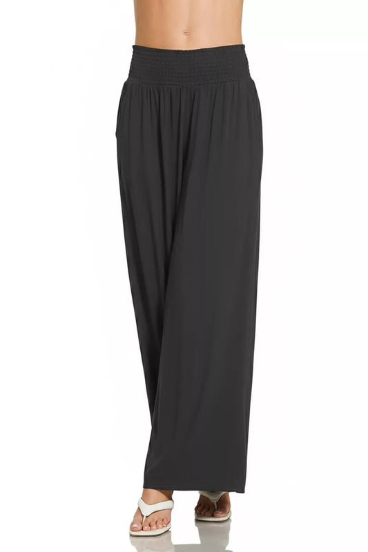 Black smocked waistband wide-leg lounge pants with relaxed straight drape
