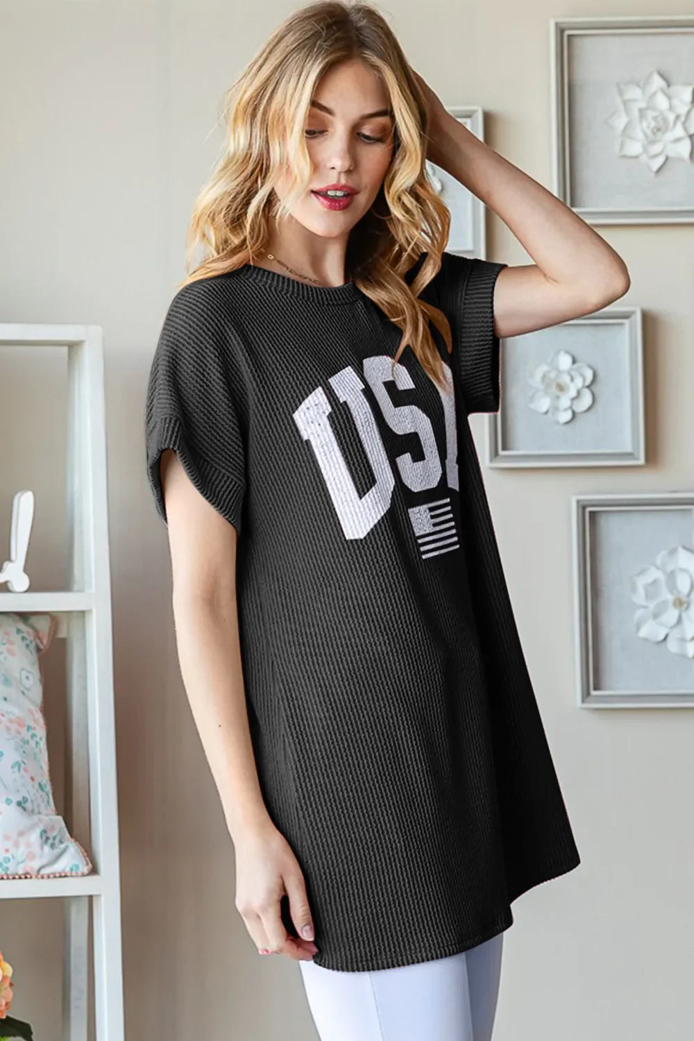 Black ribbed short-sleeve top with USA graphic and crew neck