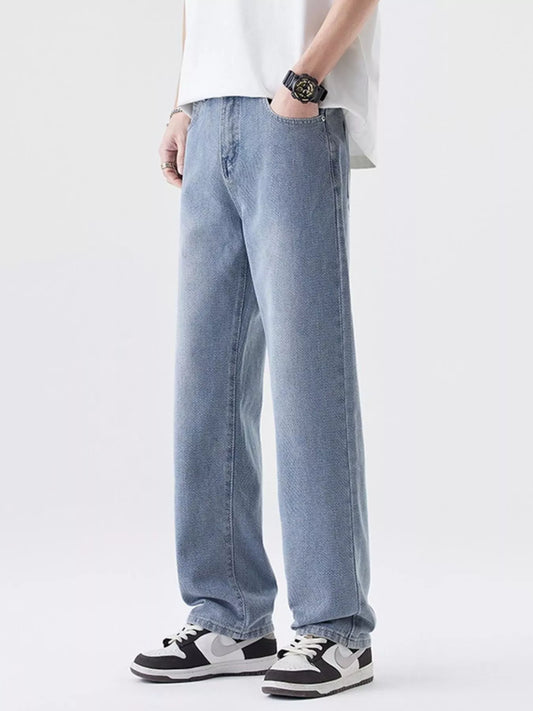 Men's wide-leg jeans in light blue wash with side pockets and clean, straight wide legs