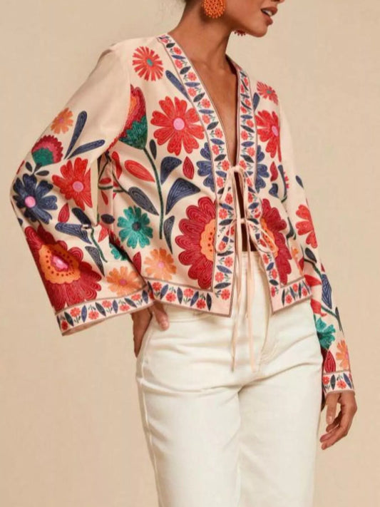 Floral embroidered tie-front shirt in cream with long sleeves and colorful blooms