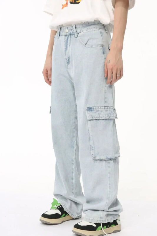 Light washed straight cargo jeans, side profile with thigh cargo pocket flaps