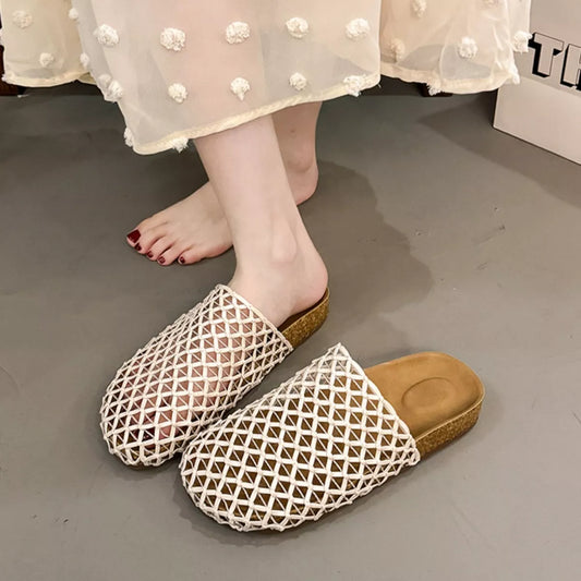 Woven mesh slip-on sandals in white with diamond lattice upper and cork-like sole