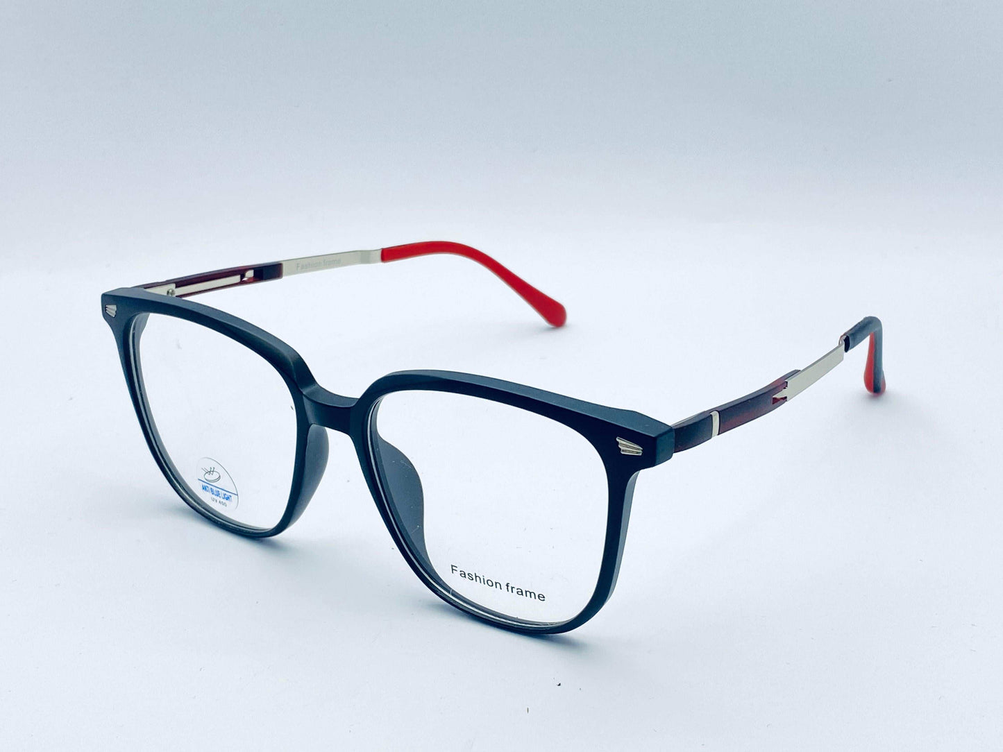 Blue eyeglasses with red and silver accents on a white background