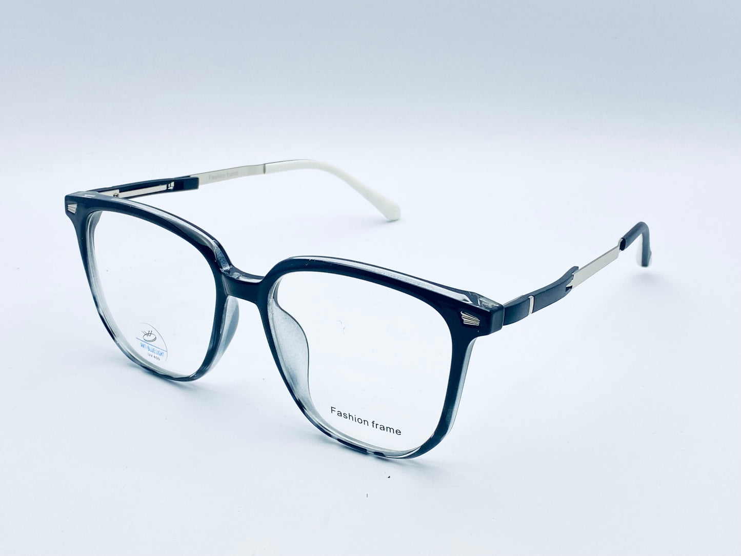 Blue eyeglasses with silver accents on a light gray background