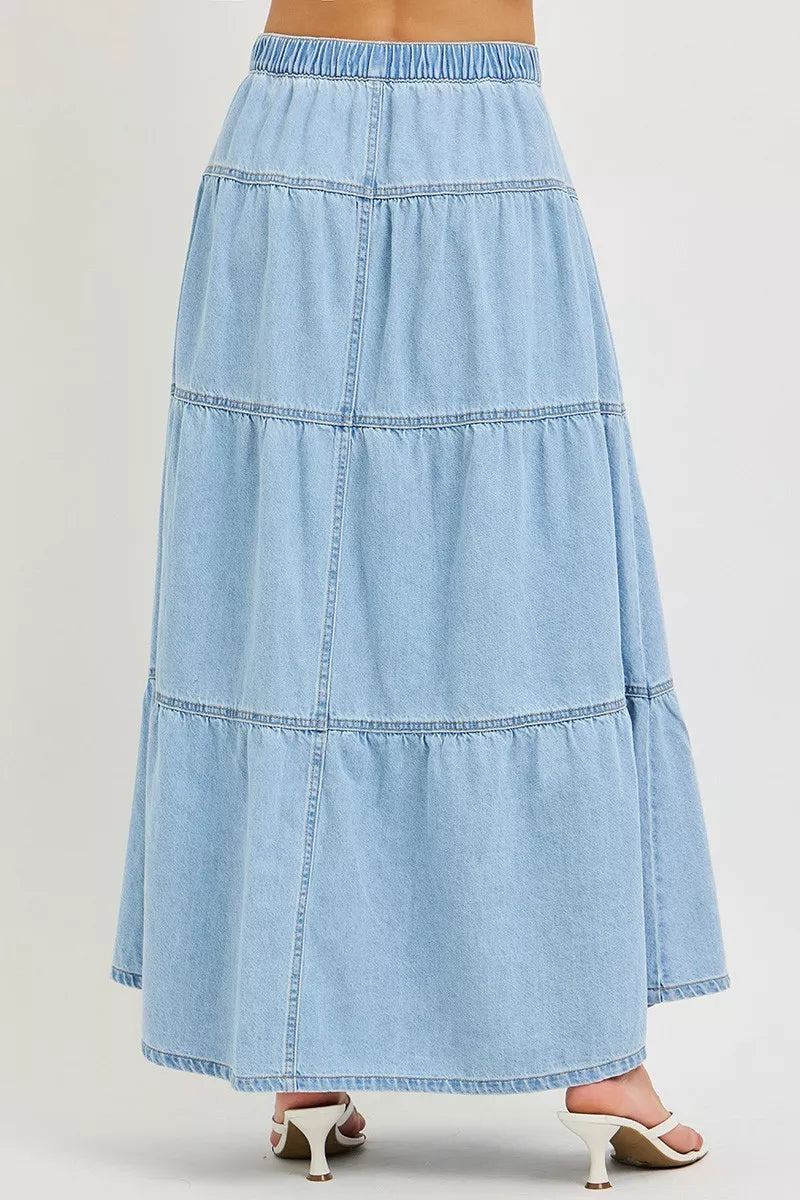 Light blue denim long skirt with tiered ruffle panels and elastic waistband