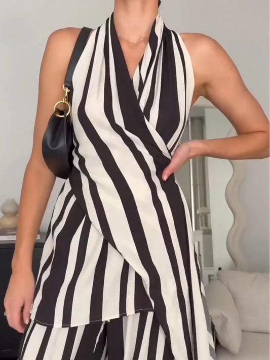 Striped halter neck top with V neckline, black and white vertical stripes