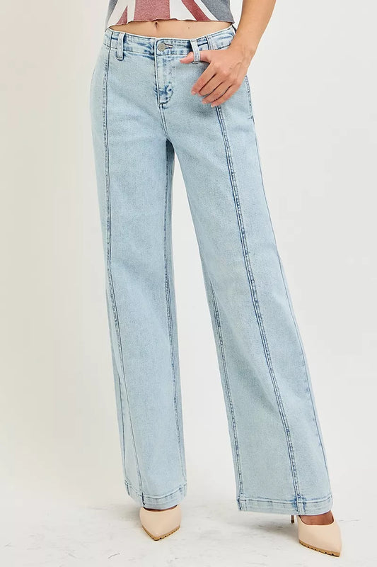 Light blue wide-leg jeans with belt loops, button fly, and stitched seams