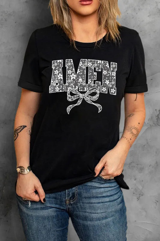 Black short-sleeve round neck T-shirt with AMEN logo and bow detail at center