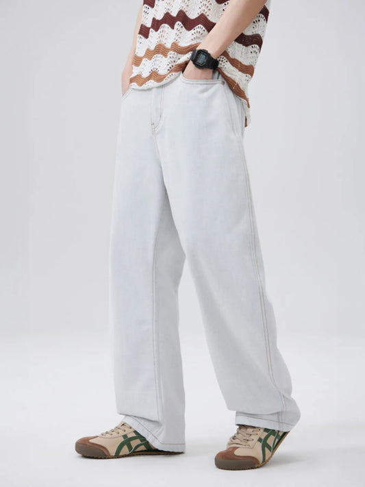 White wash wide-leg denim jeans with button fly and roomy straight legs