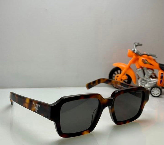 Prada unisex Sunglasses - WEARLUXURYS