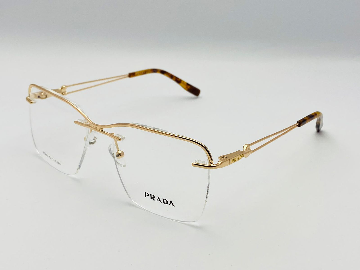 Prada Vision Rimless Glasses | Wearluxurys