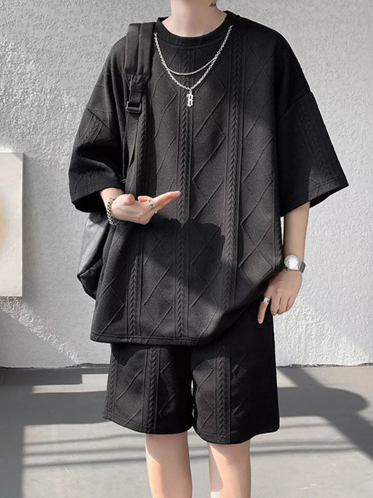 Black textured relaxed-fit top and shorts set, short sleeves, matching drawstring shorts